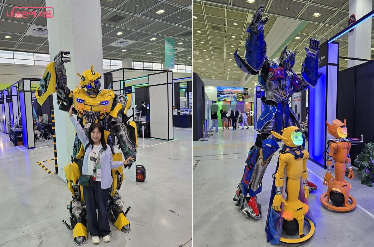 음악에 맞춰 춤을 추는 로봇과 함께 기념샷 &copy;조성희