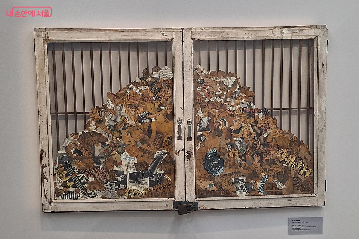 여운의 '작품 74 (Work74)'는 실제 창문 위에 신문·잡지 이미지들을 콜라주해 만들었다. ©백승훈