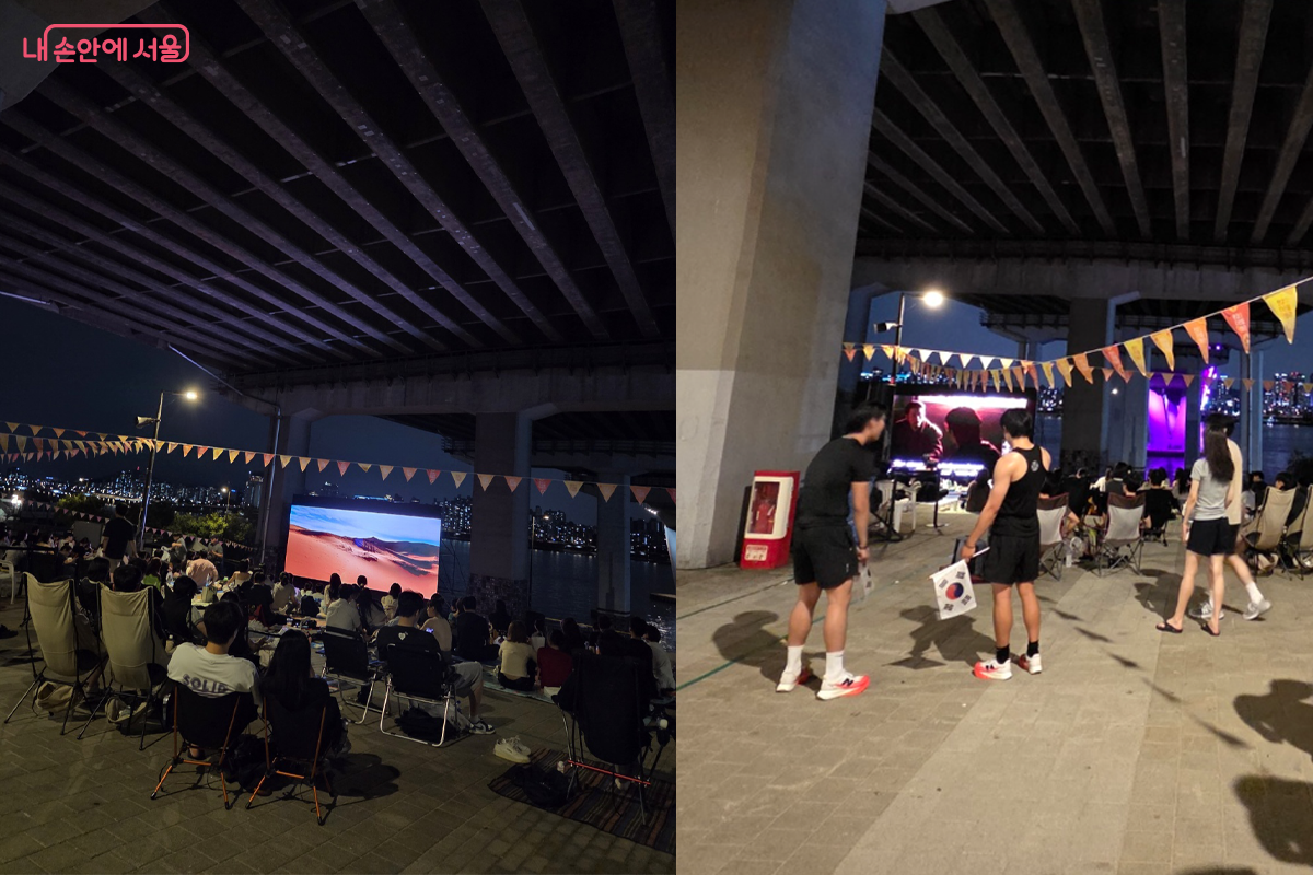 영화를 보는 시민들, 러닝 하다 잠시 멈춰 스크린을 보는 순간 애국심을 담다. &copy;장미화