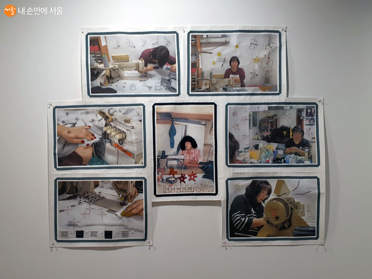 홍경애 여성 노동자가 광목천에 인쇄된 사진을 장식해 콜라보 작품을 완성하고 있다